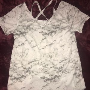 Tshirt with crosses design on neck area